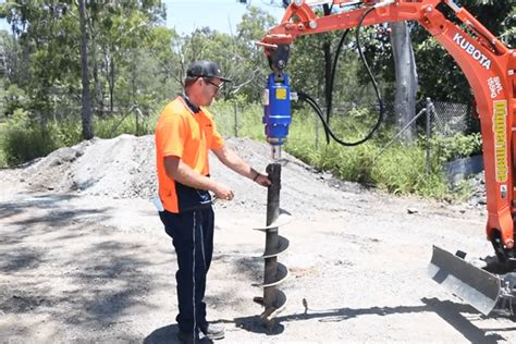 mini digger post driver|mini excavator post hole digger.